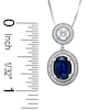 Thumbnail Image 1 of Oval Sapphire and Diamond Framed Drop Pendant in 14K White Gold