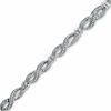 Thumbnail Image 0 of 1/5 CT. T.W. Diamond Infinity Bracelet in Sterling Silver - 7.25"