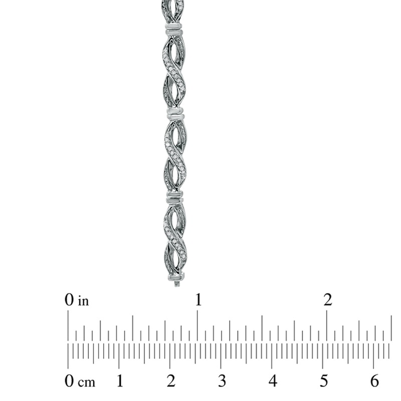 1/5 CT. T.W. Diamond Infinity Bracelet in Sterling Silver - 7.25"