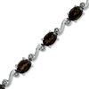 Thumbnail Image 1 of Oval Smoky Quartz and Diamond Accent Swirl Bracelet in Sterling Silver - 7.25&quot;