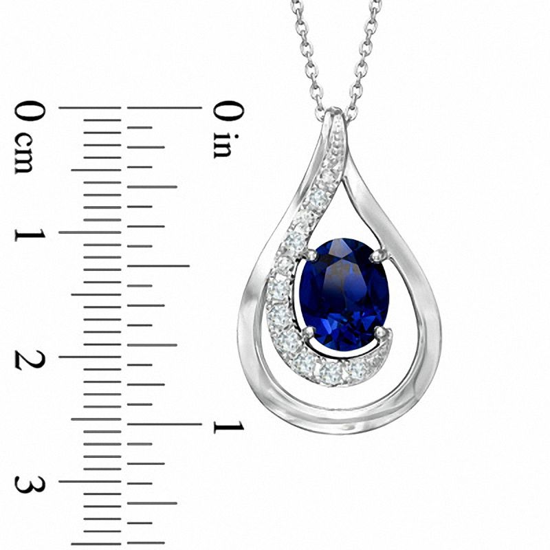 Main Image 2 of Oval Lab-Created Blue and White Sapphire Swirl Pendant in 14K White Gold