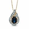 Thumbnail Image 1 of Oval Blue Sapphire and 1/5 CT. T.W. Baguette and Round Diamond Pendant in 14K Gold