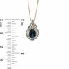 Thumbnail Image 2 of Oval Blue Sapphire and 1/5 CT. T.W. Baguette and Round Diamond Pendant in 14K Gold