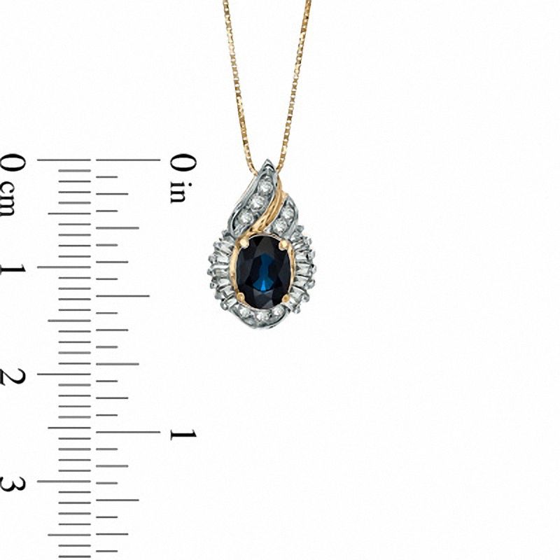 Main Image 2 of Oval Blue Sapphire and 1/5 CT. T.W. Baguette and Round Diamond Pendant in 14K Gold