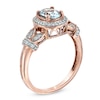 Thumbnail Image 2 of Oval Aquamarine and 1/6 CT. T.W. Diamond Frame Vine Ring in 10K Rose Gold