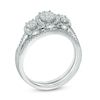 Thumbnail Image 1 of 1/2 CT. T.W. Diamond Oval Frame Three Stone Cluster Three Piece Bridal Set in 10K White Gold