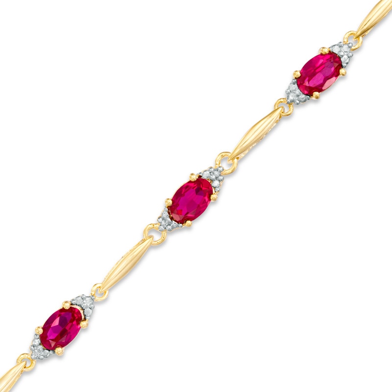 Main Image 1 of Oval Lab-Created Ruby and Diamond Accent Bracelet in Sterling Silver and 10K Gold Plate - 7.25&quot;