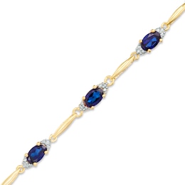 Oval Lab-Created Blue Sapphire and Diamond Accent Bracelet in Sterling Silver and 10K Gold Plate- 7.25&quot;