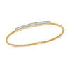 Thumbnail Image 0 of 1/4 CT. T.W. Diamond Bangle in Sterling Silver and 14K Gold Plate - 6.75"