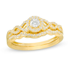 3/8 CT. T.W. Diamond Frame Twist Bridal Set in 10K Gold