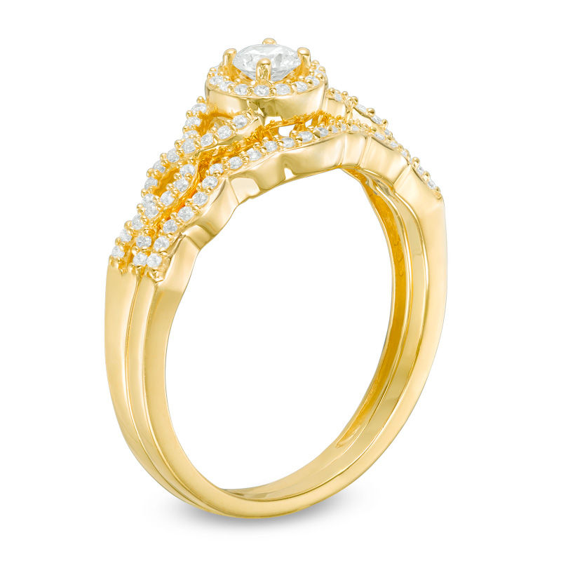 3/8 CT. T.W. Diamond Frame Twist Bridal Set in 10K Gold