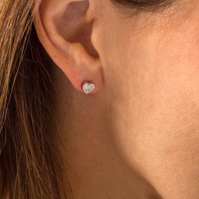 Main Image 2 of 1/8 CT. T.W. Diamond Solitaire Heart-Shaped Stud Earrings in 10K White Gold (I/I3)