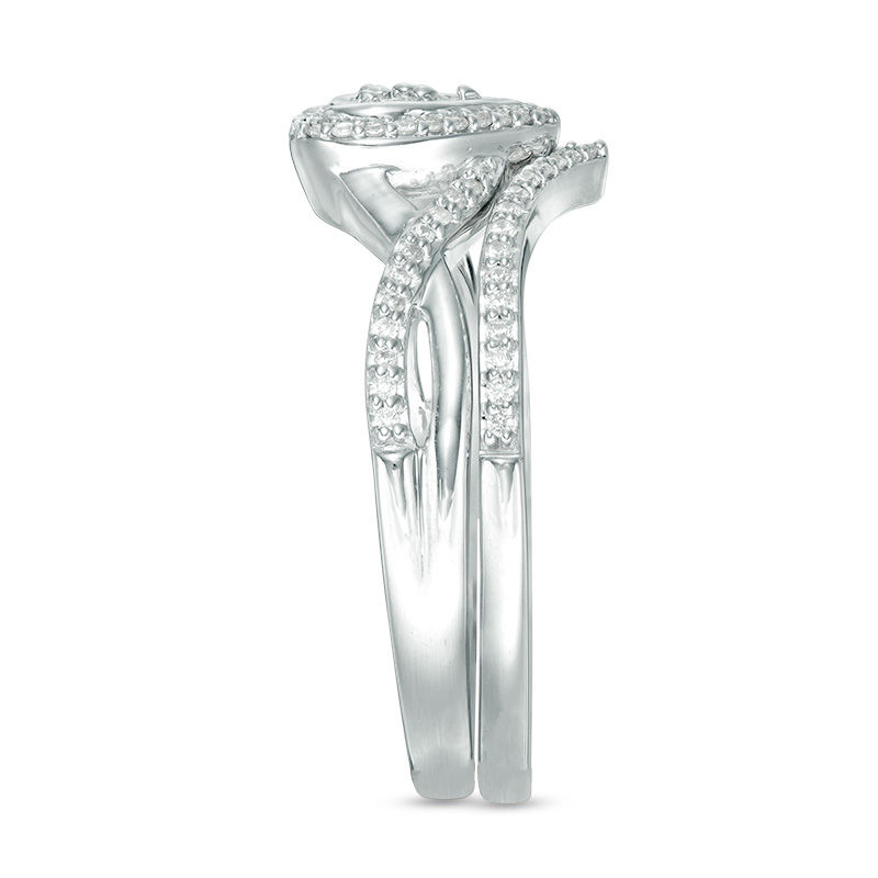 1/5 CT. T.W. Diamond Heart Frame Twist Bridal Set in 10K White Gold