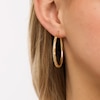 Thumbnail Image 2 of 3.0mm Diamond-Cut Basket Weave Tube Hoop Earrings in 10K Gold