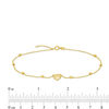 Thumbnail Image 1 of Diamond-Cut Puff Heart and Disco Bead Station Anklet in 10K Gold - 10"