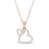 Thumbnail Image 1 of 1/20 CT. T.W. Diamond Interlocking Double Tilted Heart Pendant in 10K Rose Gold