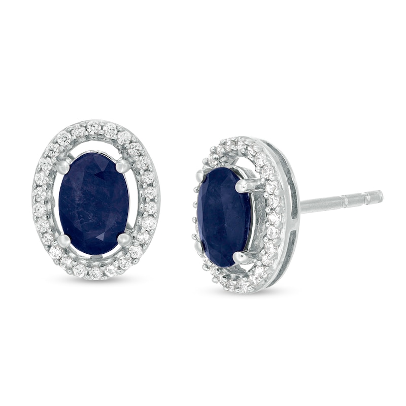Oval Blue Sapphire and 1/8 CT. T.W. Diamond Frame Stud Earrings in 10K White Gold