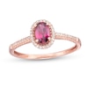 Thumbnail Image 1 of Oval Garnet and 1/10 CT. T.W. Diamond Frame Ring in 10K Rose Gold