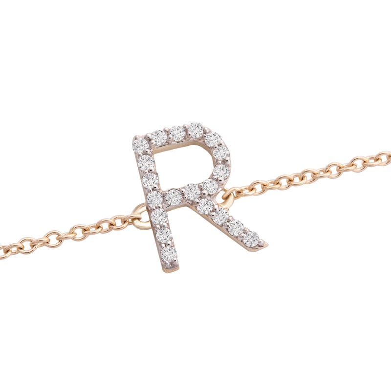1/10 CT. T.W. Diamond R Initial Bracelet in 10K Gold - 7.5