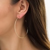 Thumbnail Image 1 of 1/3 CT. T.W. Diamond Hoop Earrings in 10K Gold