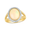 Thumbnail Image 0 of Oval Opal and 1/10 CT. T.W. Diamond Frame Rope-Textured Split Shank Ring in 14K Gold