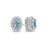 Thumbnail Image 1 of Oval Aquamarine and 1/6 CT. T.W. Diamond Frame Stud Earrings in 10K White Gold