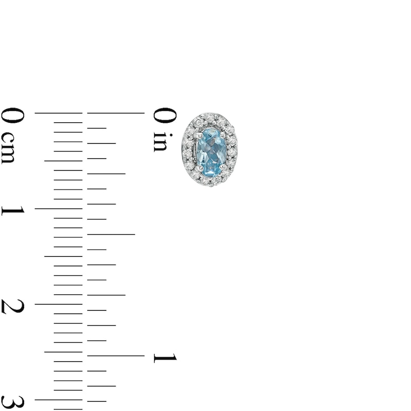 Main Image 2 of Oval Aquamarine and 1/6 CT. T.W. Diamond Frame Stud Earrings in 10K White Gold