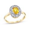 Thumbnail Image 1 of Oval Yellow Sapphire and 1/5 CT. T.W. Diamond Frame Ring in 14K Gold