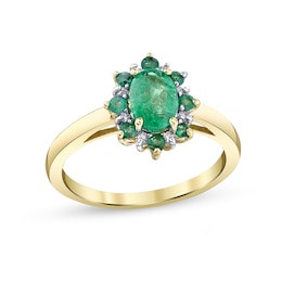 Oval Emerald and 1/20 CT. T.W. Diamond Frame Sunburst Ring in 14K Gold