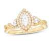 Thumbnail Image 1 of 5/8 CT. T.W. Marquise Diamond Frame Past Present Future® Twist Shank Engagement Ring in 10K Gold (I/I2)