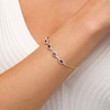 Thumbnail Image 2 of Oval Ruby and Diamond Accent Twist Five Stone Bracelet in 10K Gold – 8.0&quot;