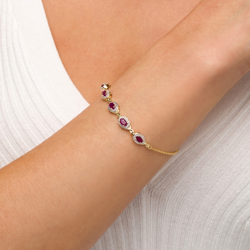 Main Image 2 of Oval Ruby and Diamond Accent Twist Five Stone Bracelet in 10K Gold – 8.0&quot;