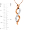 Thumbnail Image 1 of 1/3 CT. T.W. Diamond Twist Pendant in 14K Two-Tone Gold