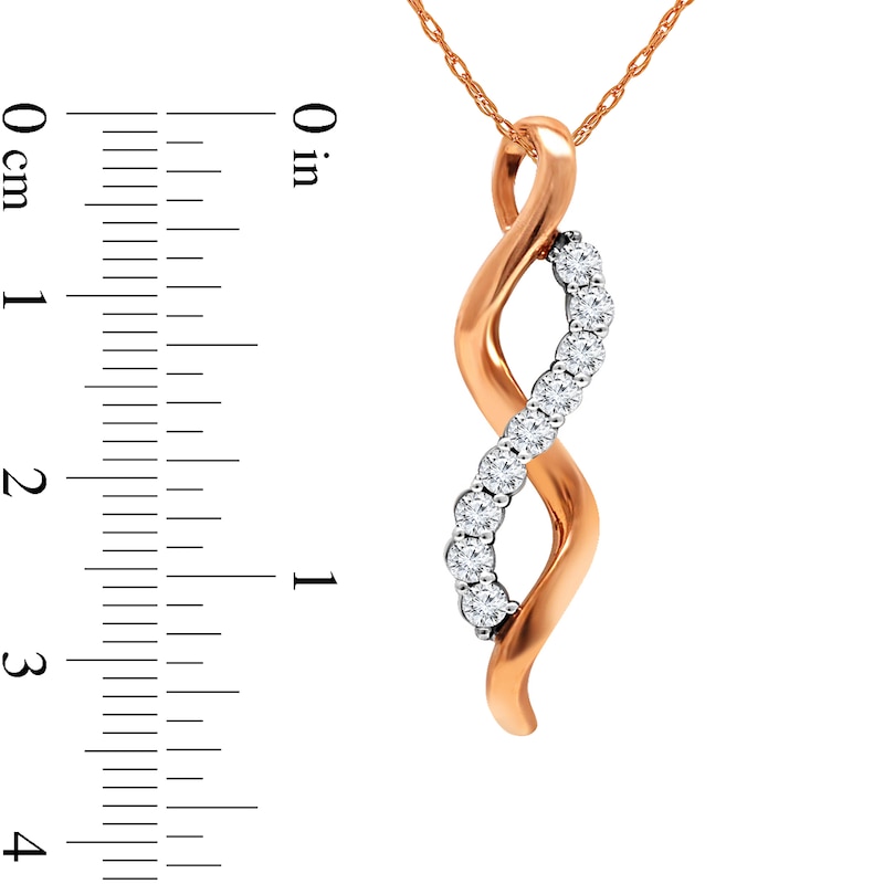 Main Image 2 of 1/3 CT. T.W. Diamond Twist Pendant in 14K Two-Tone Gold