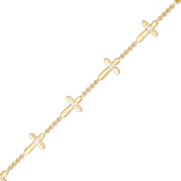 1/8 CT. T.W. Diamond Sideways Gothic-Style Cross Station Bracelet in 10K Gold – 7.25&quot;