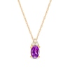 Thumbnail Image 1 of Oval Amethyst and 1/20 CT. T.W. Diamond Pendant in 10K Gold