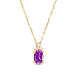 Oval Amethyst and 1/20 CT. T.W. Diamond Pendant in 10K Gold