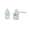 Thumbnail Image 1 of Oval Aquamarine and 1/20 CT. T.W. Diamond Stud Earrings in 10K White Gold