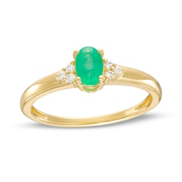 Oval Emerald and 1/20 CT. T.W. Diamond Tri-Sides Ring in 10K Gold - Size 7