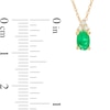 Thumbnail Image 3 of Oval Emerald and 1/20 CT. T.W. Diamond Tri-Sides Pendant in 10K Gold