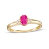 Thumbnail Image 1 of Oval Ruby and 1/20 CT. T.W. Diamond Tri-Sides Ring in 10k Gold - Size 7