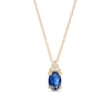 Thumbnail Image 1 of Oval Blue Sapphire and 1/20 CT. T.W. Diamond Pendant in 10K Gold