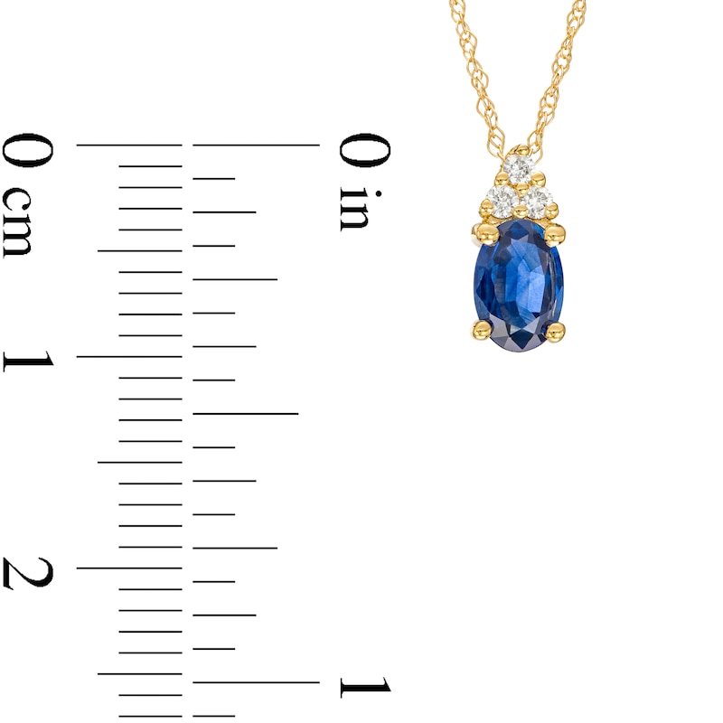 Main Image 3 of Oval Blue Sapphire and 1/20 CT. T.W. Diamond Pendant in 10K Gold