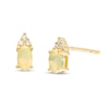 Thumbnail Image 1 of Oval Opal and 1/20 CT. T.W. Diamond Stud Earrings in 10K Gold