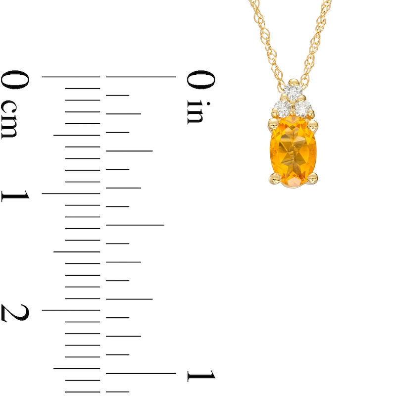 Main Image 3 of Oval Citrine and 1/20 CT. T.W. Diamond Pendant in 10K Gold