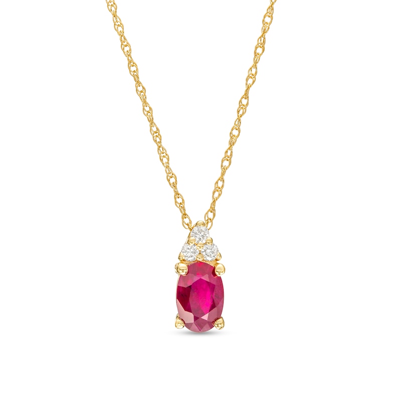 Main Image 1 of Oval Ruby and 1/20 CT. T.W. Diamond Pendant in 10K Gold