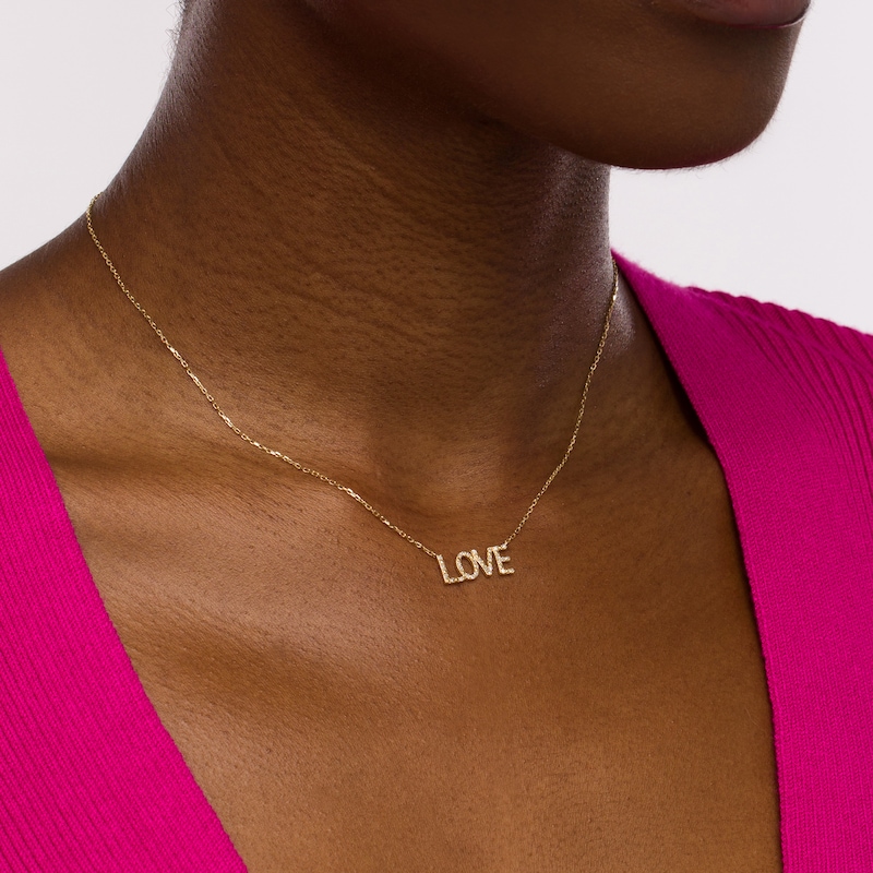 Main Image 2 of 1/15 CT. T.W. Diamond &quot;LOVE&quot; Necklace in 10K Gold - 16&quot;