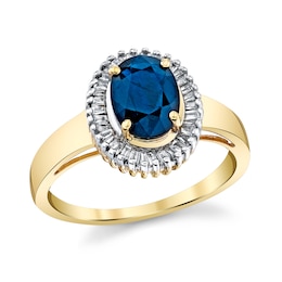 Oval Blue Sapphire and 1/6 CT. T.W. Baguette Diamond Frame Ring in 14K Gold