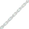 Thumbnail Image 1 of Oval Lab-Created Opal and Diamond Accent Alternating Line Bracelet in Sterling Silver – 7.25&quot;