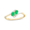 Thumbnail Image 1 of Oval Emerald and 1/20 CT. T.W. Diamond Bypass Ring in 10K Gold